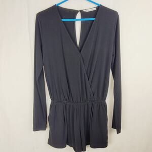 BCBGeneration black vneck long sleeved romper Size small pockets Goth Staple